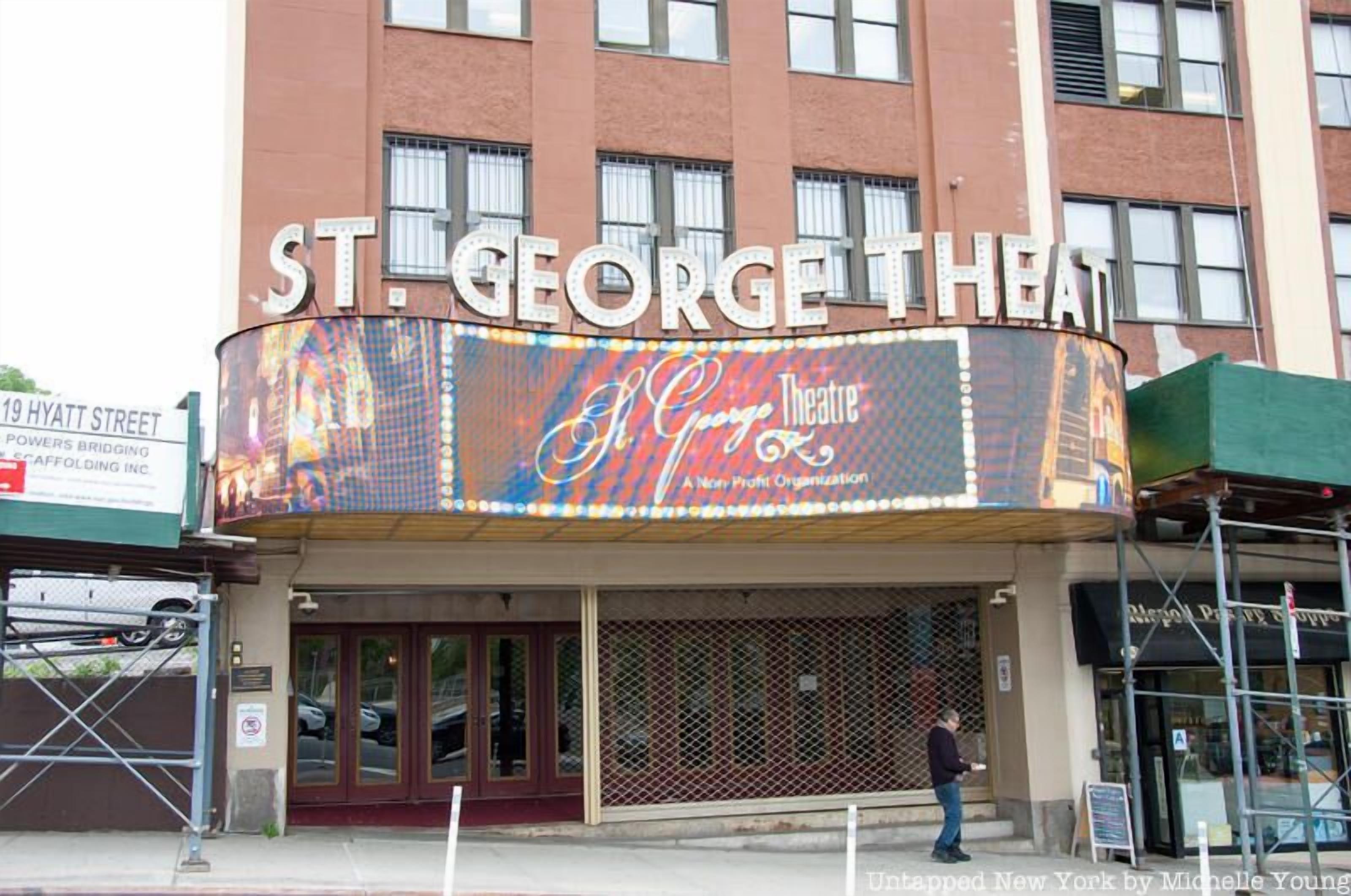 The exterior of St. George Theatre with a marquee advertising the "St. George Theatre" and "A New Profit Organization."