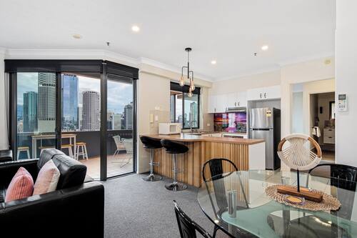 Deluxe Apartment, 1 Bedroom | Living area | 55-inch TV with cable channels