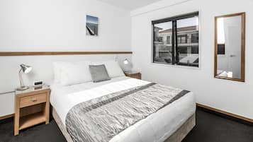 Apartamento familiar | Caja fuerte, cortinas opacas, tabla de planchar con plancha