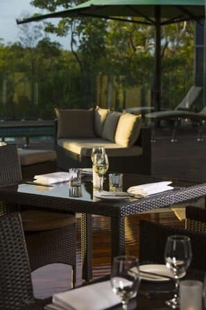 Breakfast, lunch, dinner served; Regional cuisine, pool views 