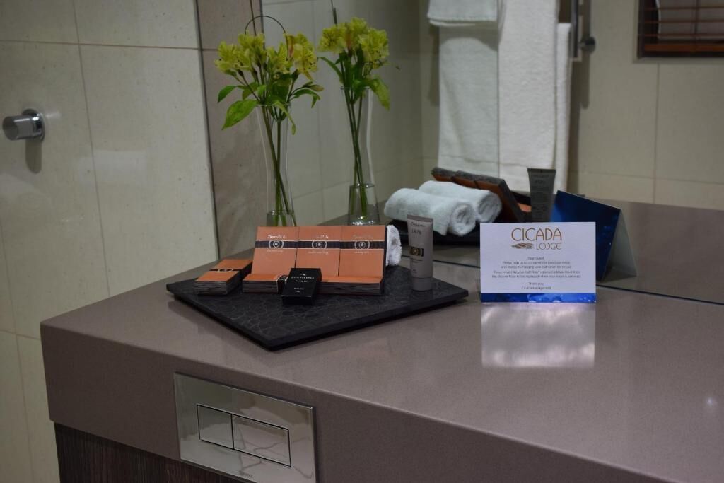 shower, designer toiletries, bathrobes, slippers