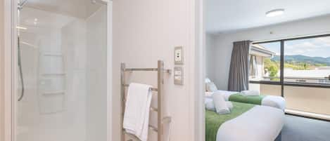 Twin/Triple Studio | Bathroom | Shower, free toiletries, hair dryer, towels