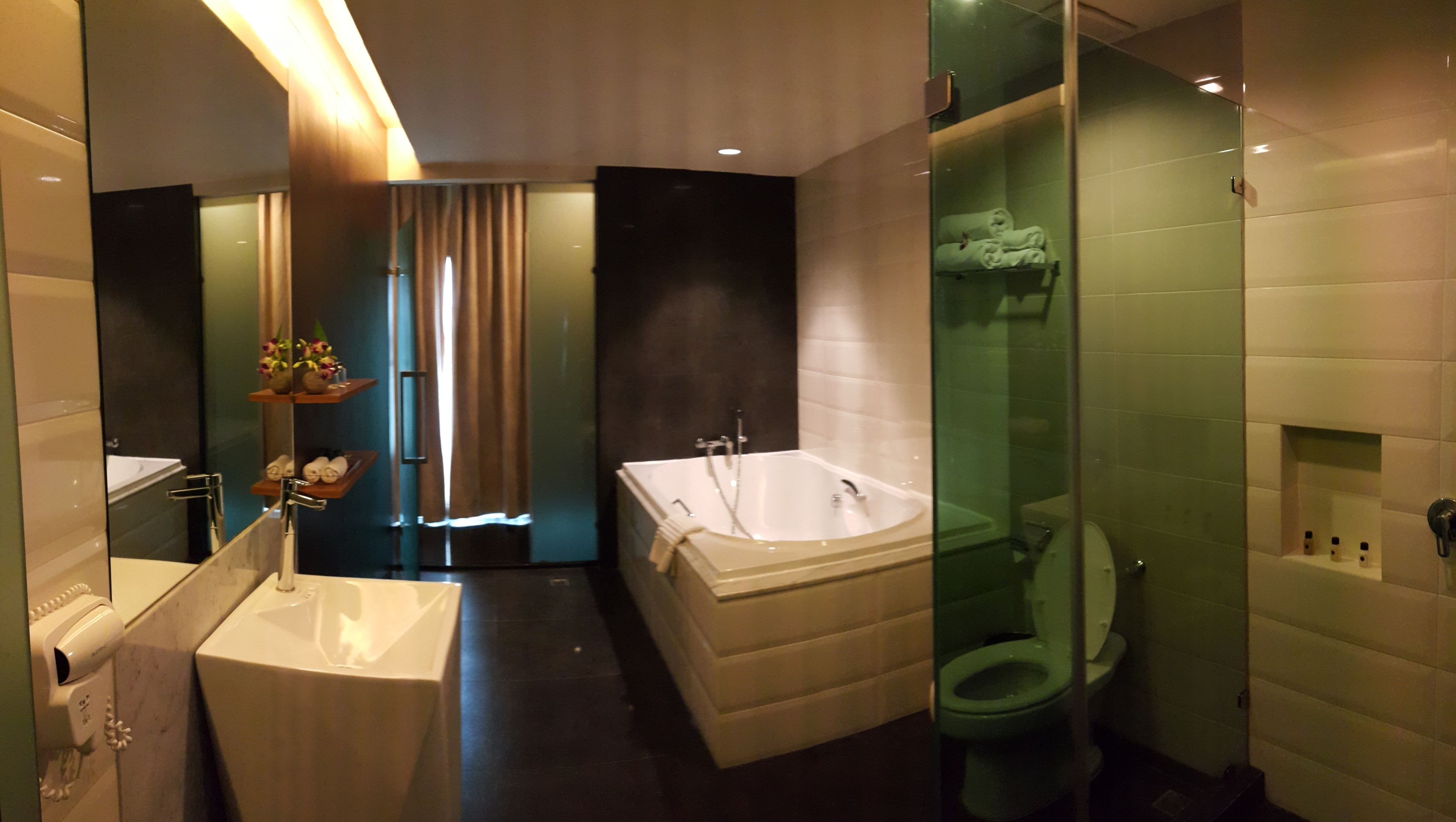 mini suite | bathroom | separate bathtub and shower, designer toiletries, hair dryer, bathrobes