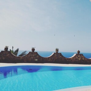 2 outdoor pools, open 9:30 AM to 7:00 PM, pool umbrellas, sun loungers