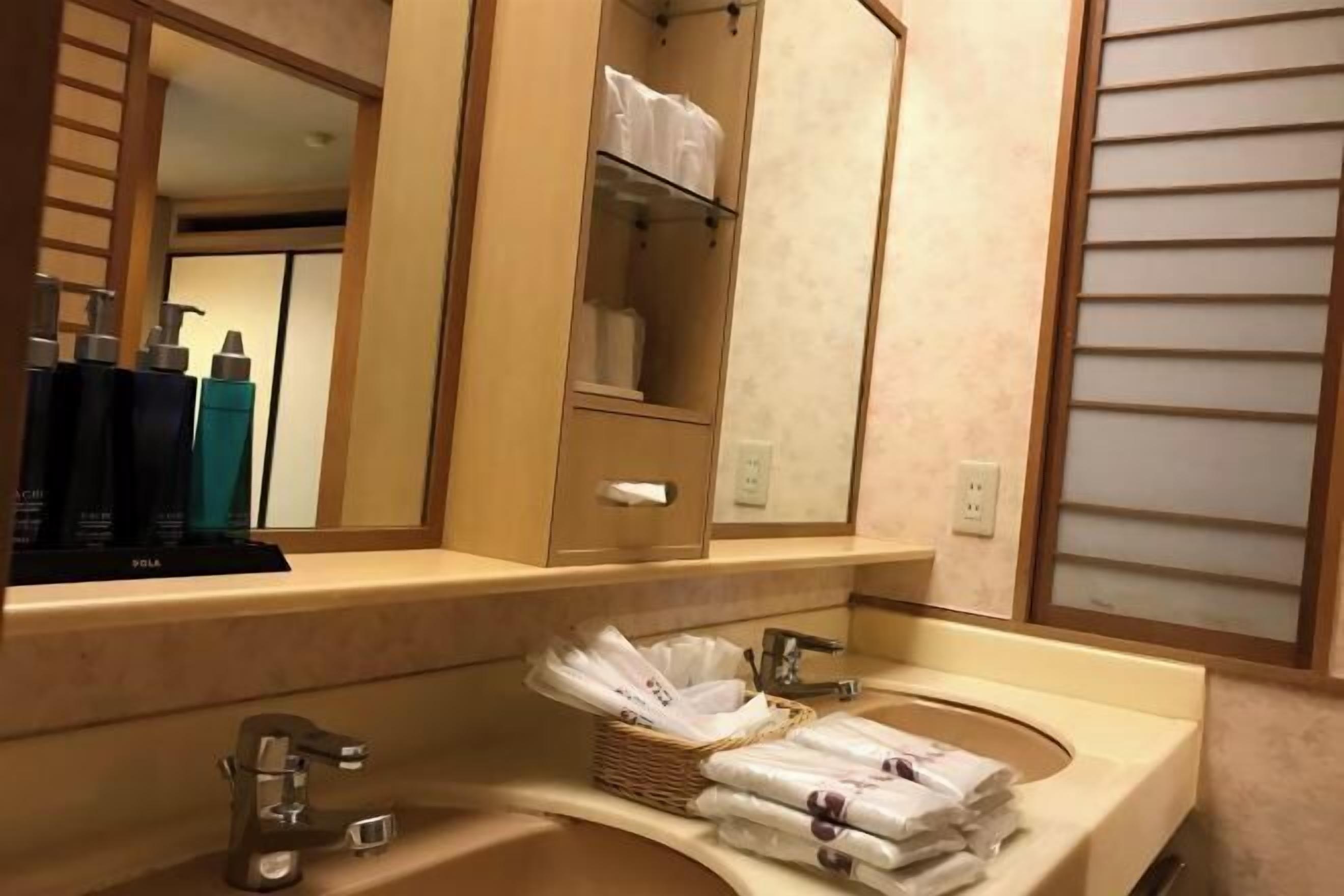 Free toiletries, hair dryer, slippers, electronic bidet