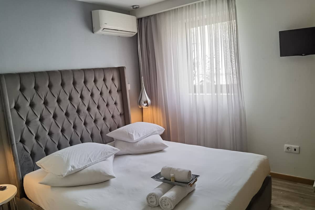 Standard Suite | 1 bedroom, down duvets, individually decorated, blackout curtains