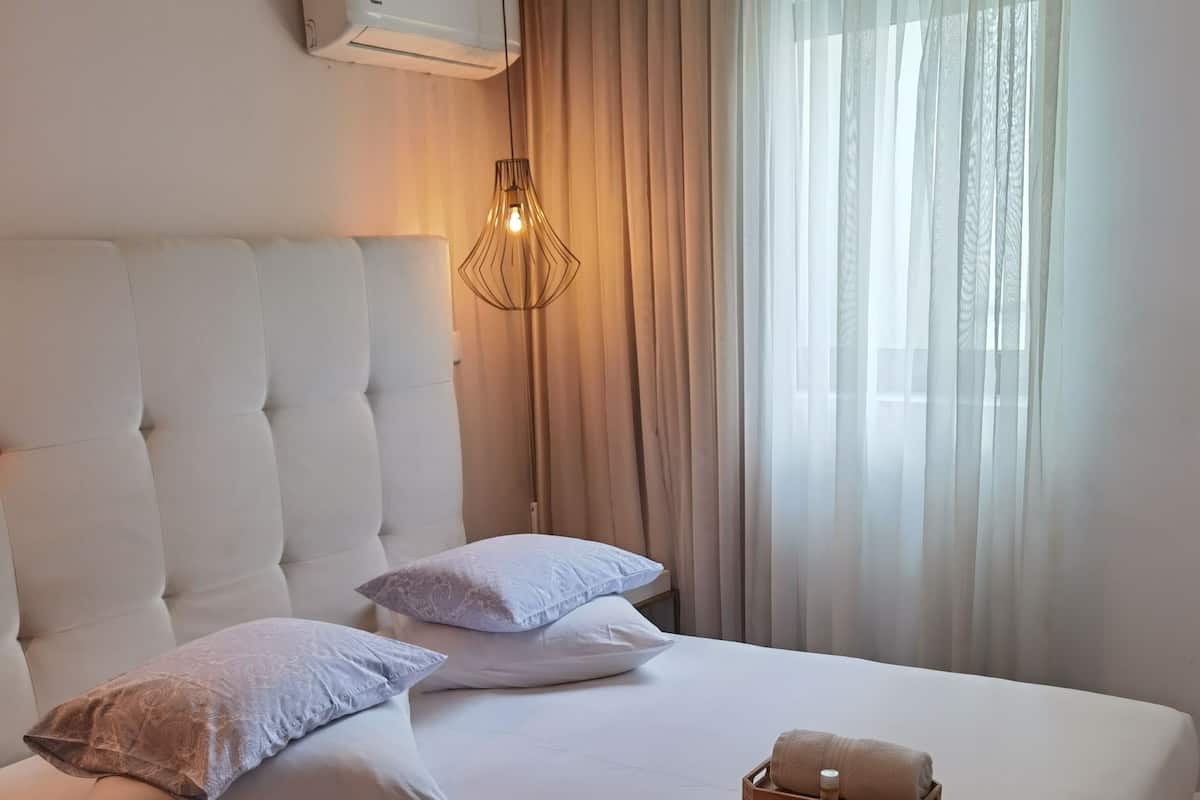 Suíte luxo | Edredons de pluma, cortinas blackout, quartos à prova de som