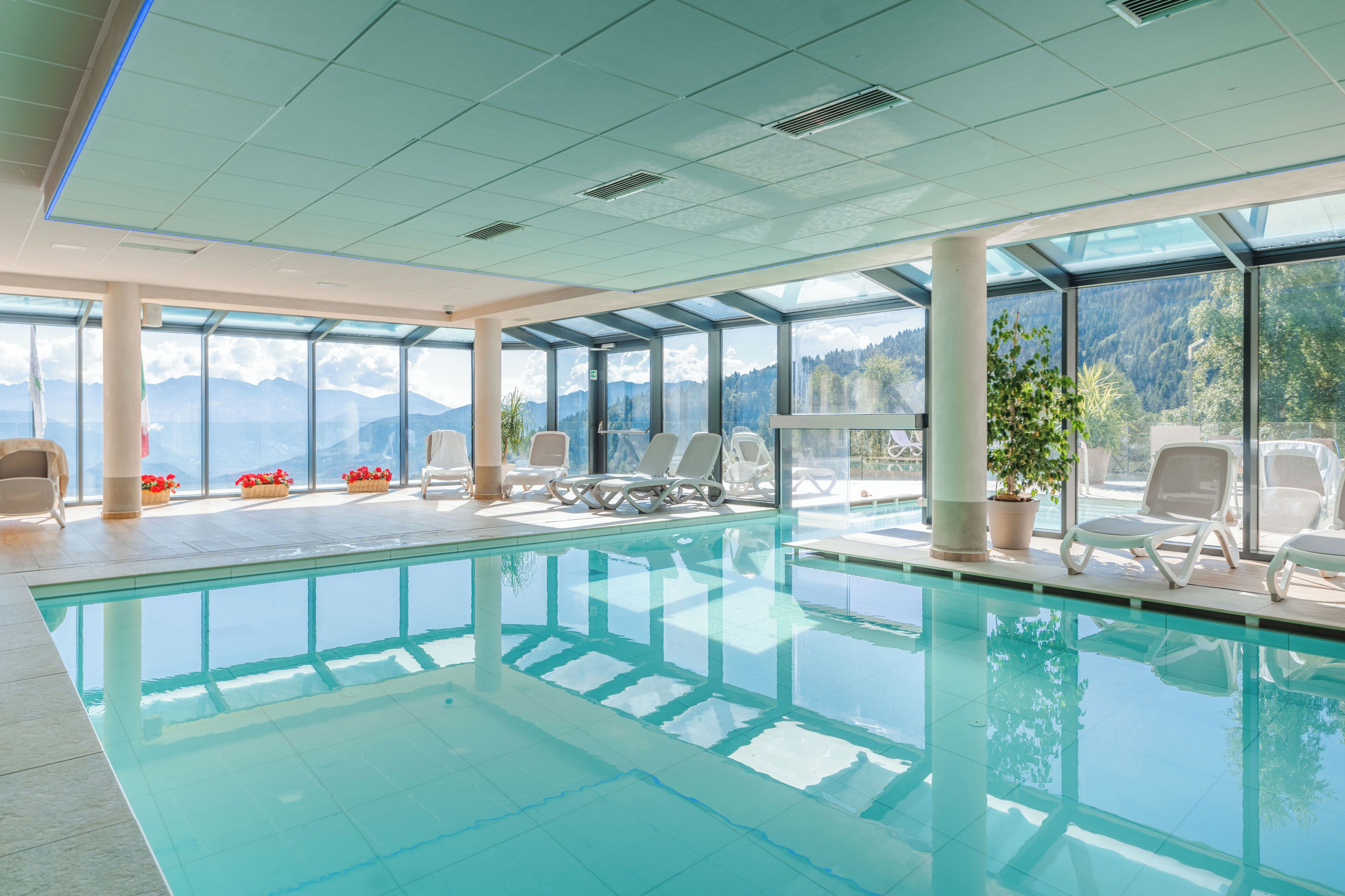 indoor pool, outdoor pool, pool umbrellas, pool loungers