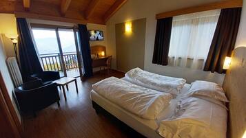Double Room, Balcony, Mountain View | Minibar, in-room safe, individually decorated, individually furnished