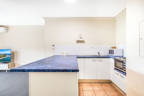 Large One Bedroom Apartment - Beachside Plus | Private kitchen - Belaire Place Motel Apartments (Caloundra)