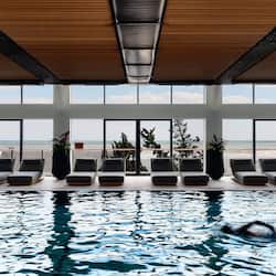 Indoor pool, seasonal outdoor pool, pool loungers