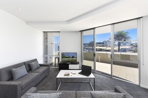 Desk, laptop workspace, iron/ironing board, cribs/infant beds