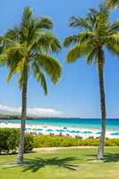 White sand, beach towels