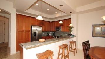 Condo, 2 Bedrooms, Lanai | Private kitchen | Fridge, microwave, oven, stovetop