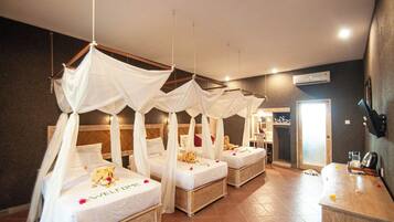 Family Quadruple Room, Garden View | 1 bedroom, pillowtop beds, in-room safe, individually decorated