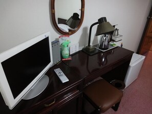 Desk, laptop workspace, free wired Internet, bed sheets