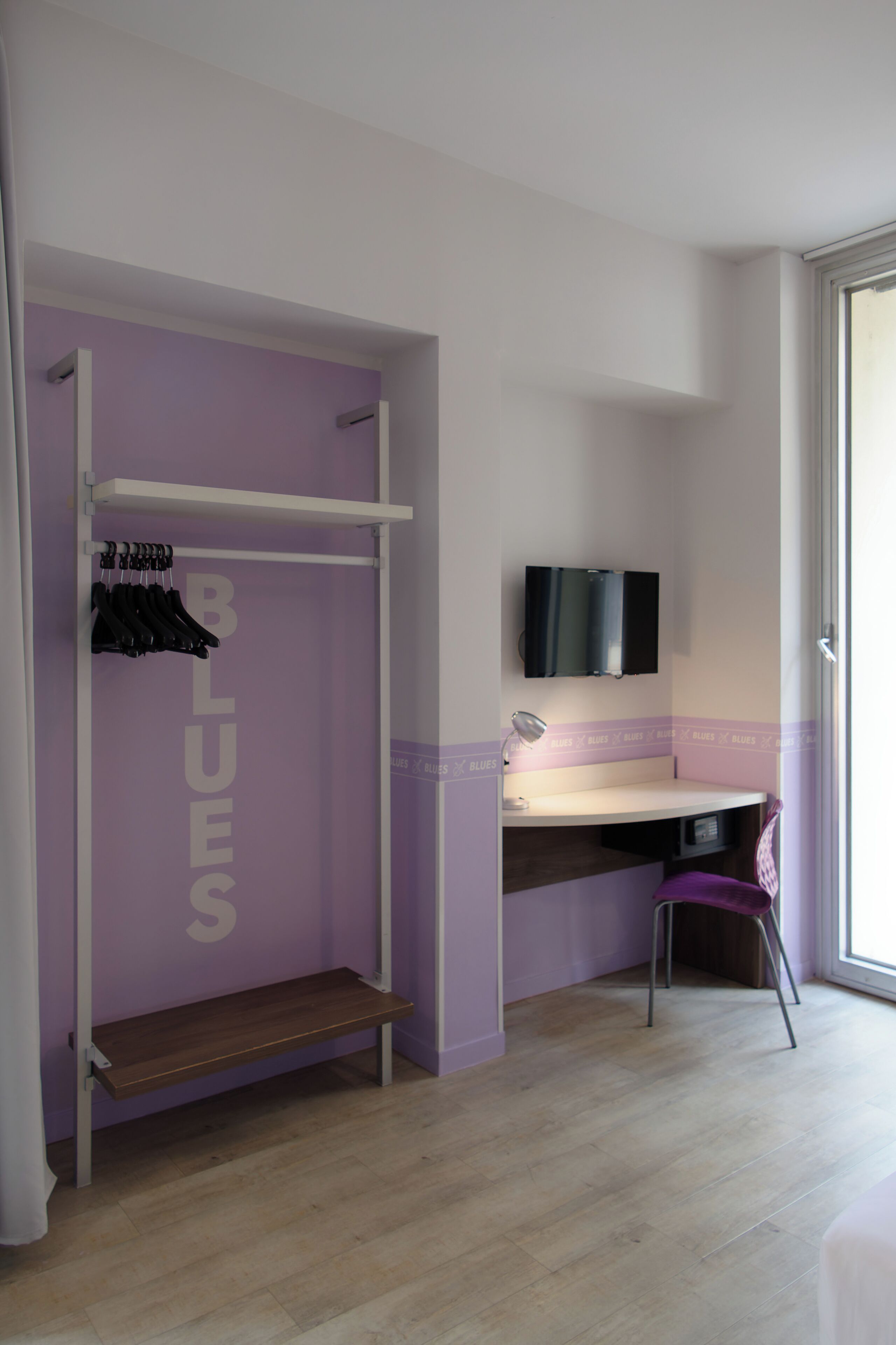 deluxe quadruple room | down duvets, desk, laptop workspace, free wifi