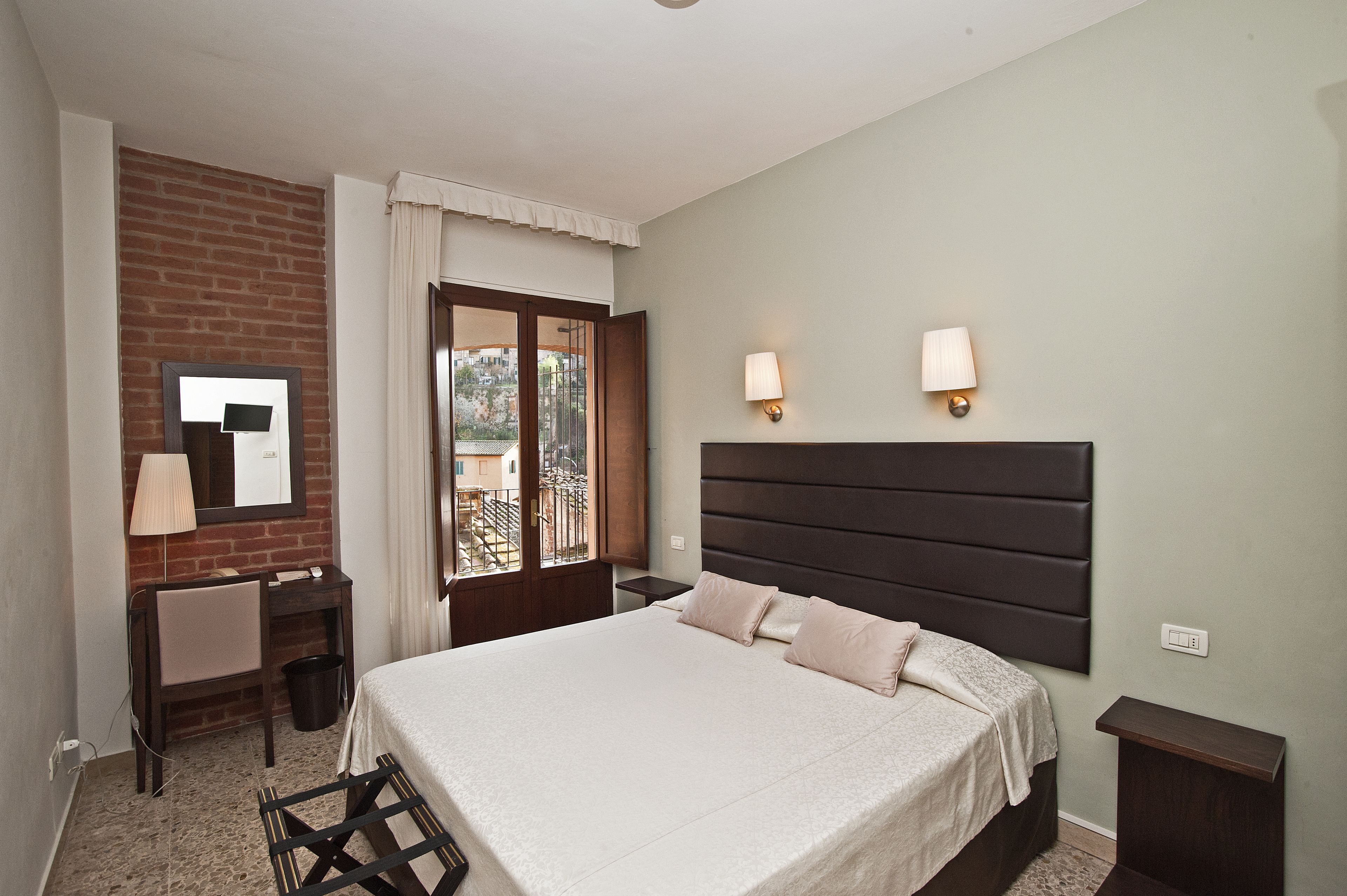 classic double room, balcony, city view | down duvets, in-room safe, desk, blackout curtains