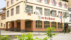A building with the sign "Vockshaut" indicating it is a hotel. - Hotel Restaurant Bockshaut (Darmstadt)