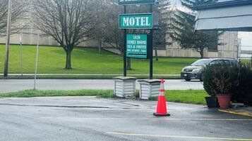 A motel sign with "FALLS" and "MOTEL" indicating the location.