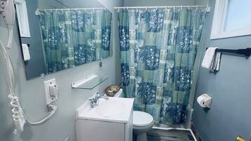 Shower, free toiletries, hair dryer, towels