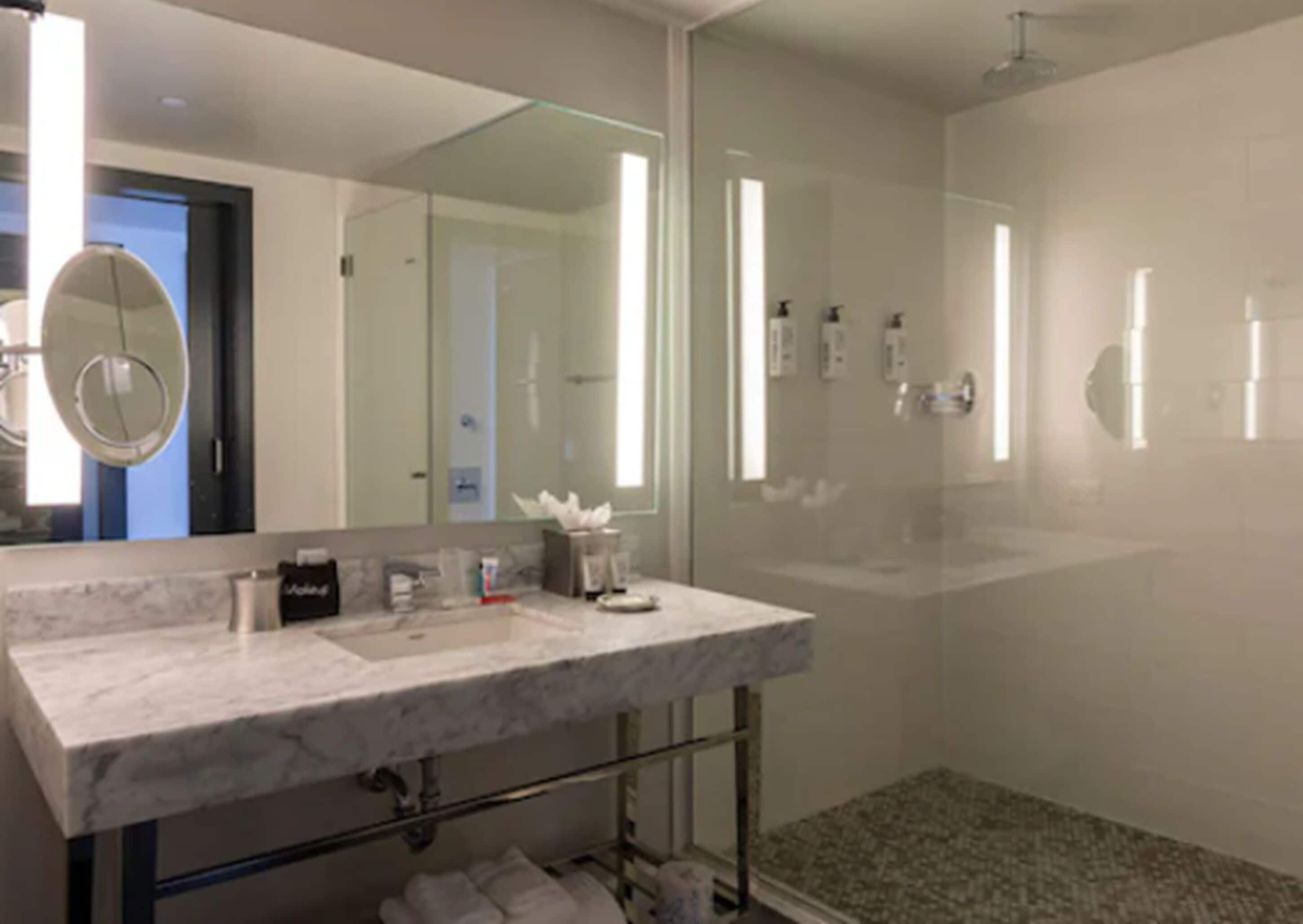 rainfall showerhead, designer toiletries, hair dryer, bathrobes