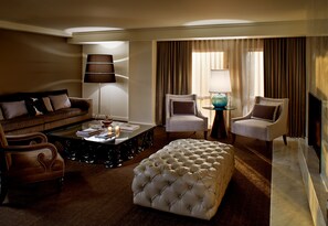 Suite, 1 King Bed | Living room | 55-inch flat-screen TV with cable channels, TV, Netflix - The Fontaine (Kansas City)