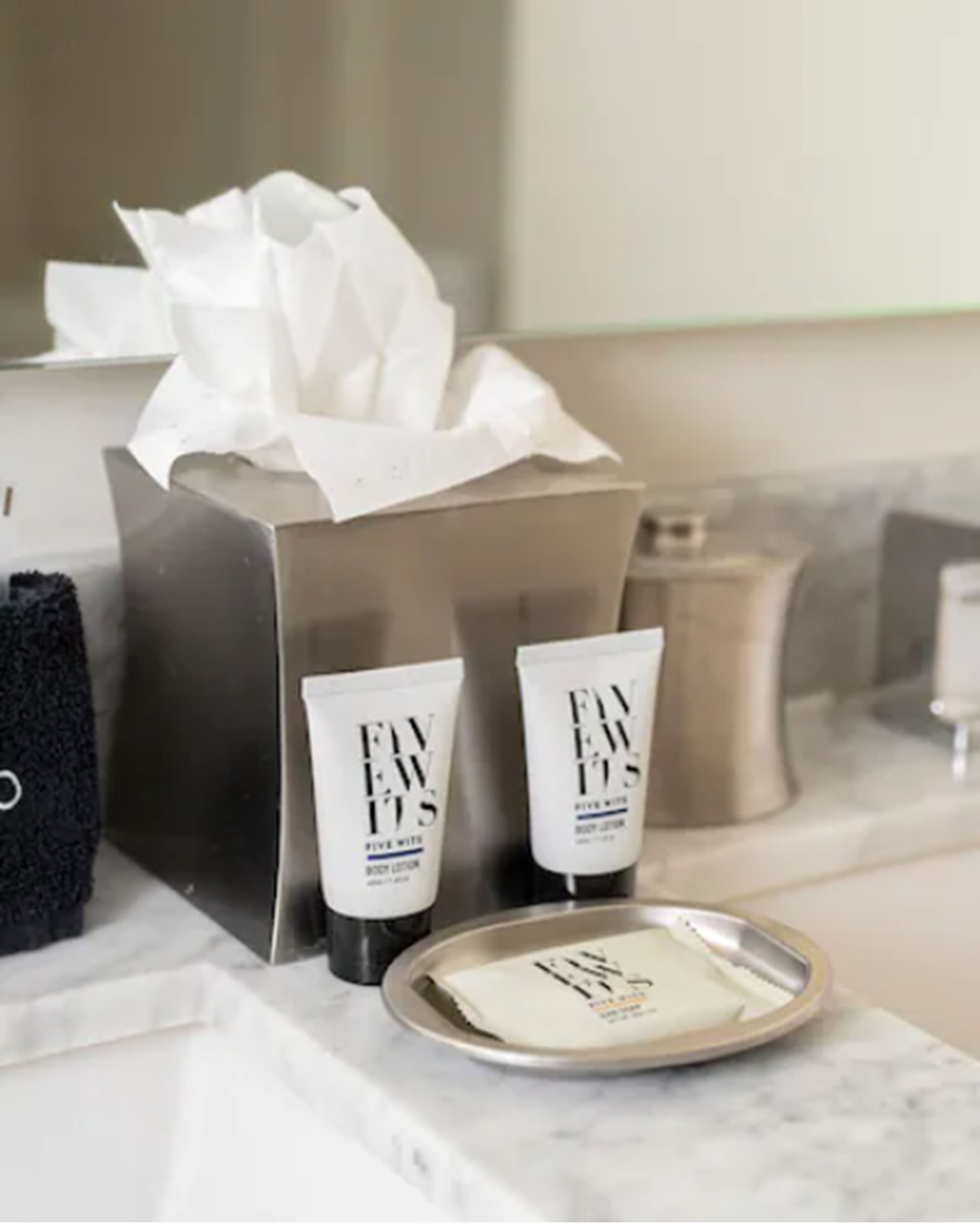 rainfall showerhead, designer toiletries, hair dryer, bathrobes