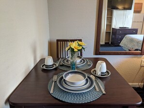 Deluxe Room, 1 Bedroom | 1 bedroom, premium bedding, in-room safe, desk - Athens Hotel Suites (Houston)