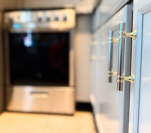 Mini-fridge, microwave, oven, stovetop