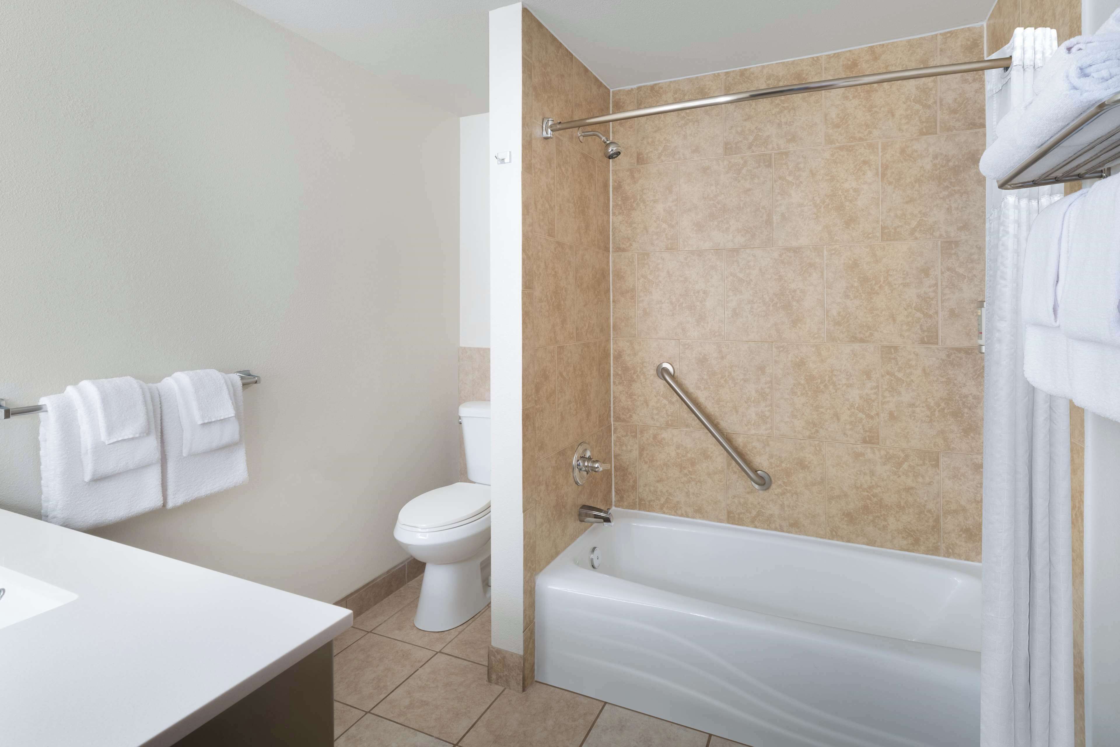 family suite, 2 queen beds, non smoking, refrigerator & microwave | bathroom | free toiletries, hair dryer, towels