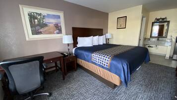 Habitación estándar, 1 cama King size | Ropa de cama de alta calidad y decoración personalizada