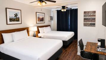 Premium Queen Room with Two Queen Beds | Iron/ironing board, free WiFi, bed sheets