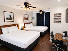 Premium Queen Room with Two Queen Beds | Iron/ironing board, free WiFi, bed sheets