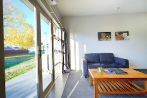 Family Suite | Living area | 42-inch Smart TV with digital channels