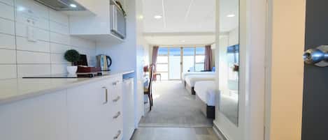 Mini-fridge, coffee/tea maker, electric kettle, toaster