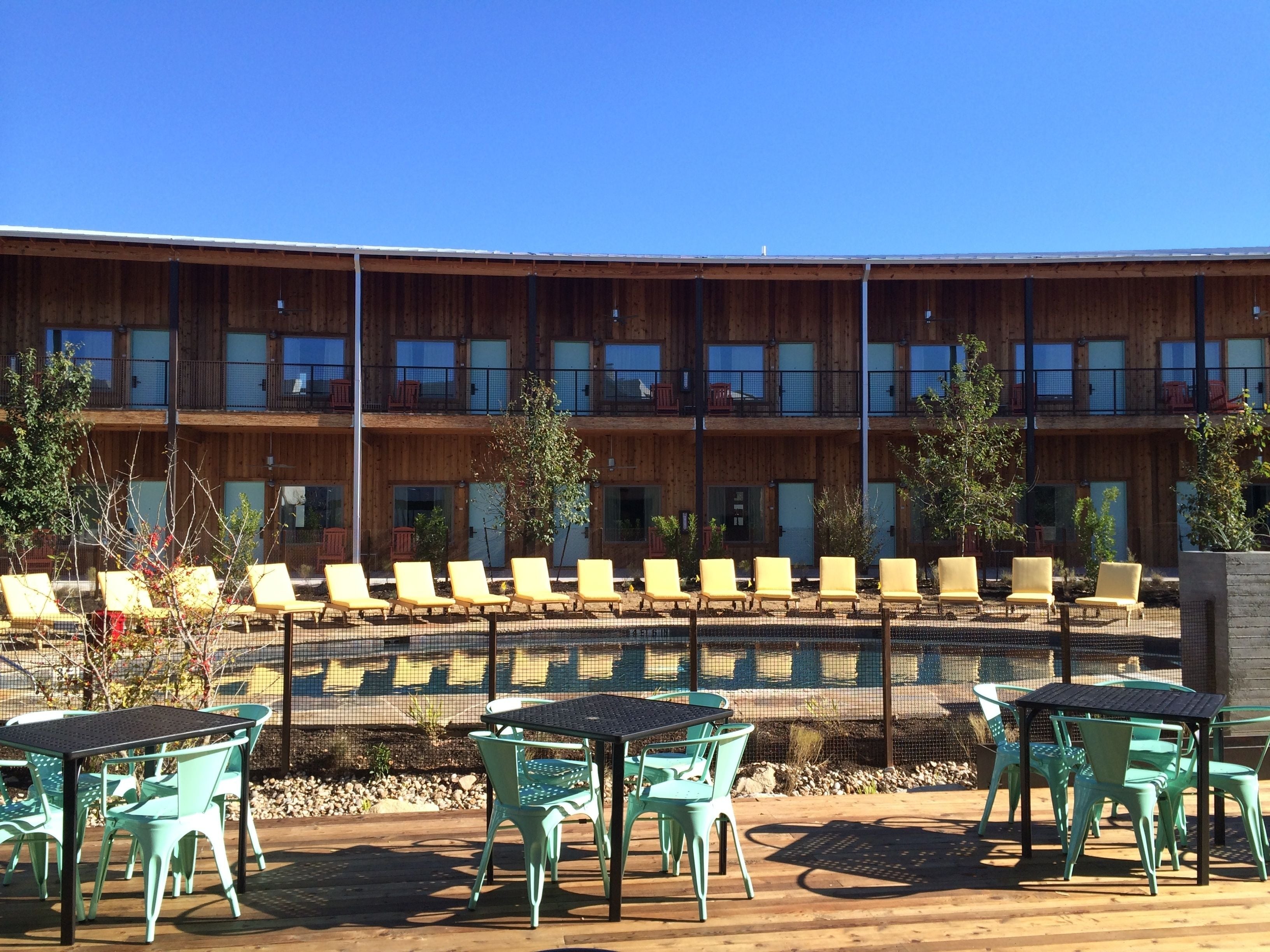 outdoor pool, open 9:00 am to 9:00 pm, pool umbrellas, pool loungers