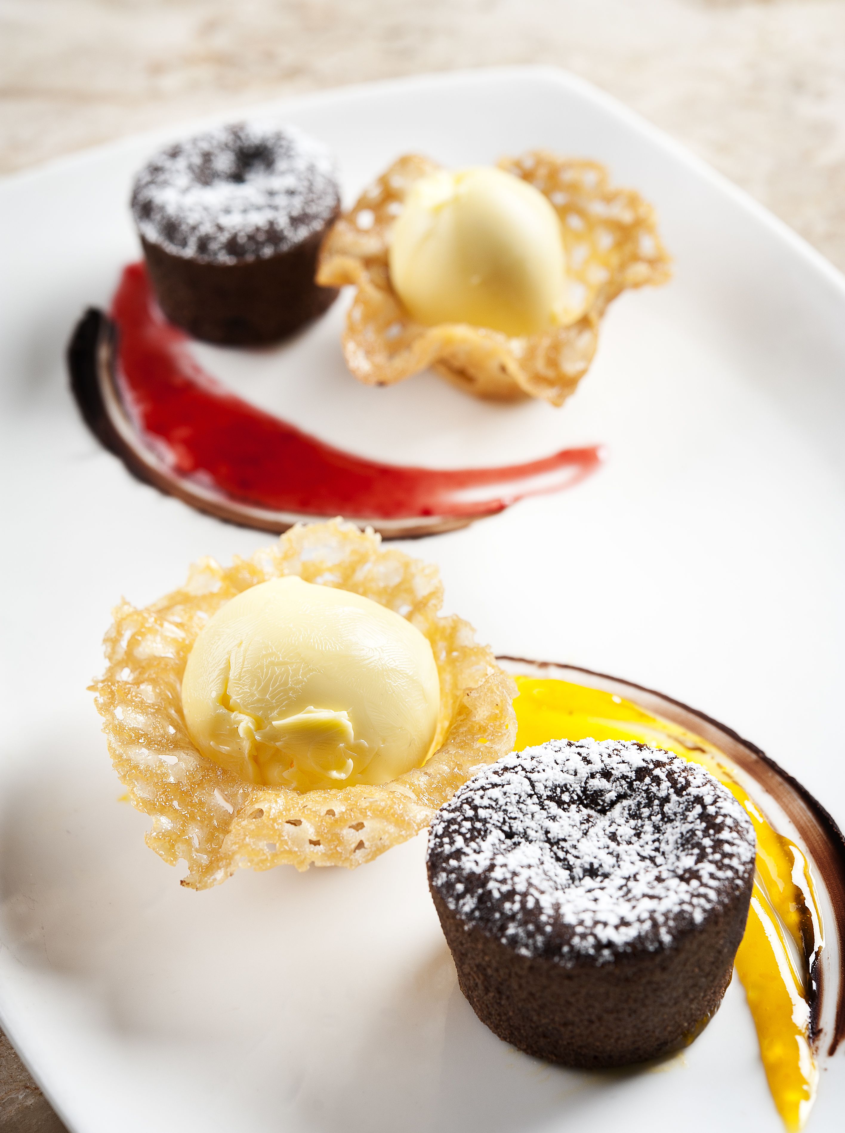 A dessert plate with three different types of desserts.