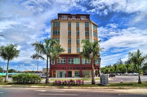 A multi-story hotel with a prominent sign reading 'ZARA'S ROTTINE HOTEL'.