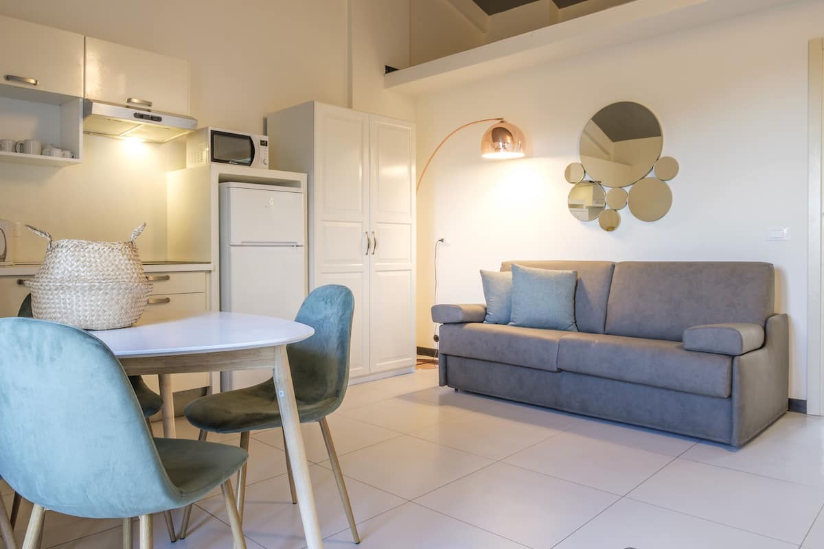 Suite, 1 Bedroom | Living area | Ping pong