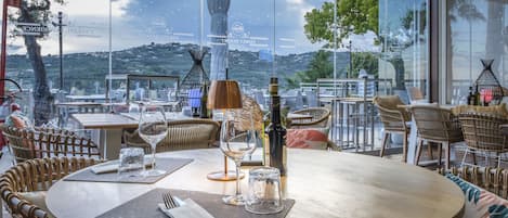 Breakfast, dinner served; local cuisine, al fresco dining