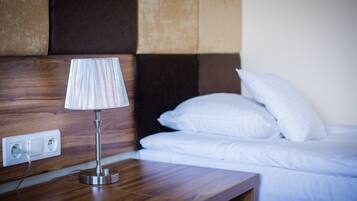 Single Room | Premium bedding, desk, blackout drapes, iron/ironing board