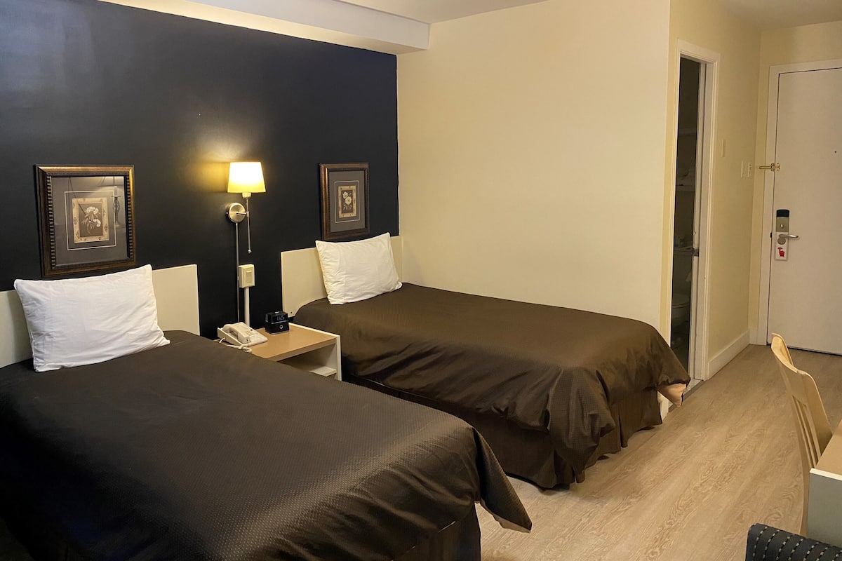 Economy Twin Room, 2 Twin Beds | Desk, laptop workspace, blackout drapes, iron/ironing board