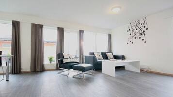 Apartment, 2 Bedrooms | Living area | Flat-screen TV