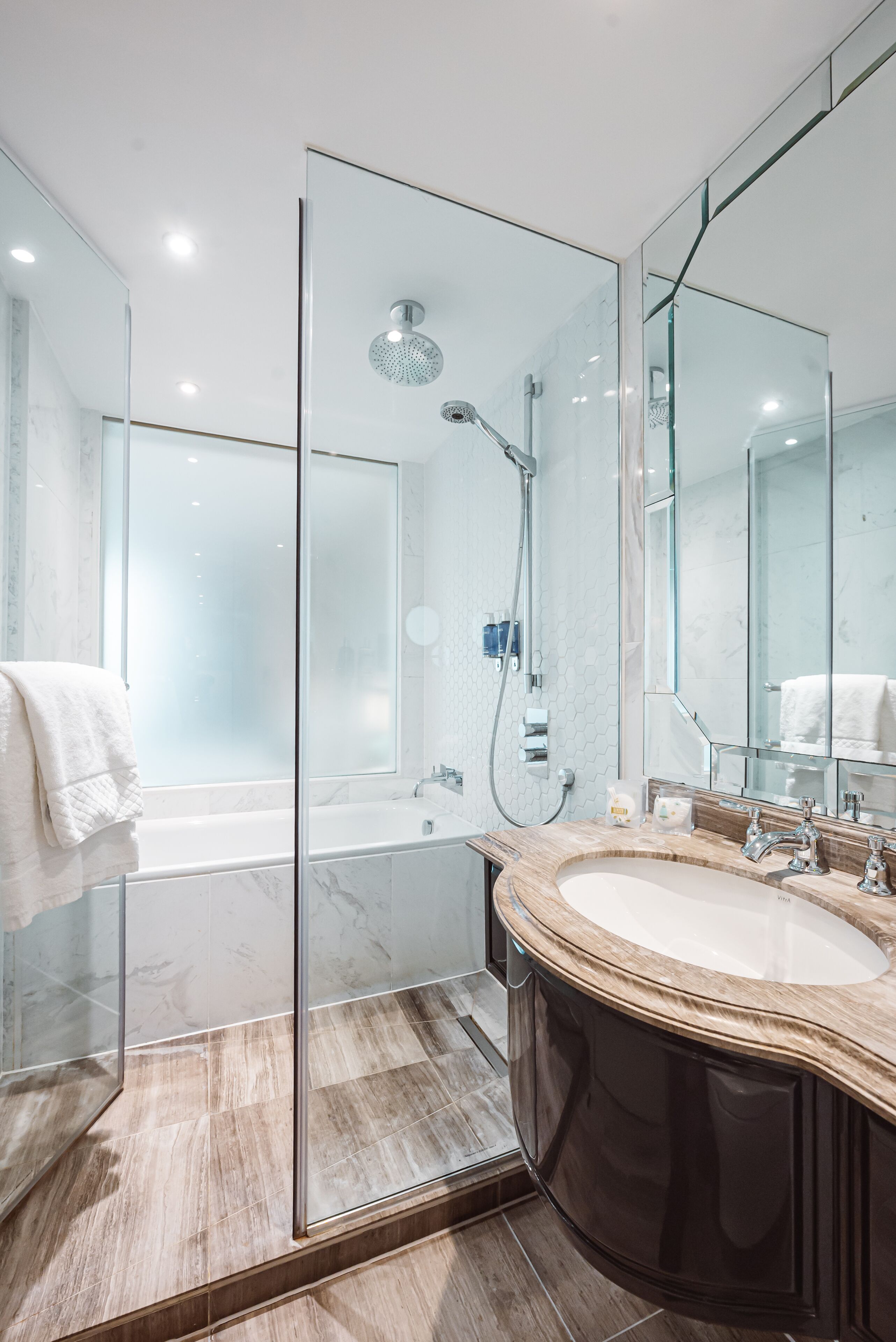 deluxe room, 1 king bed | bathroom | shower, free toiletries, hair dryer, towels