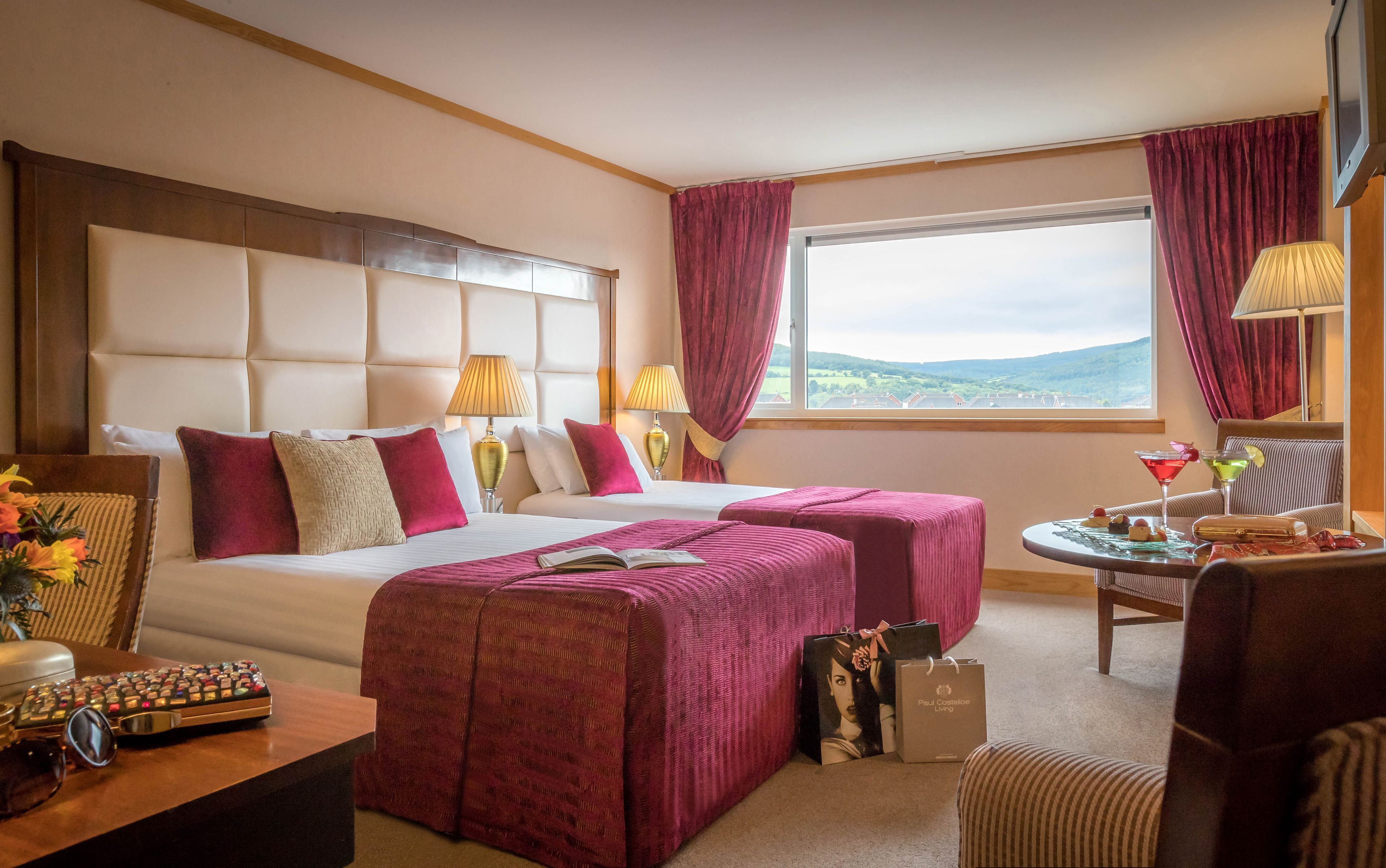 Premium bedding, desk, laptop workspace, blackout curtains