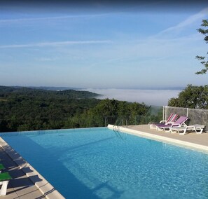 Seasonal outdoor pool, pool umbrellas, sun loungers
