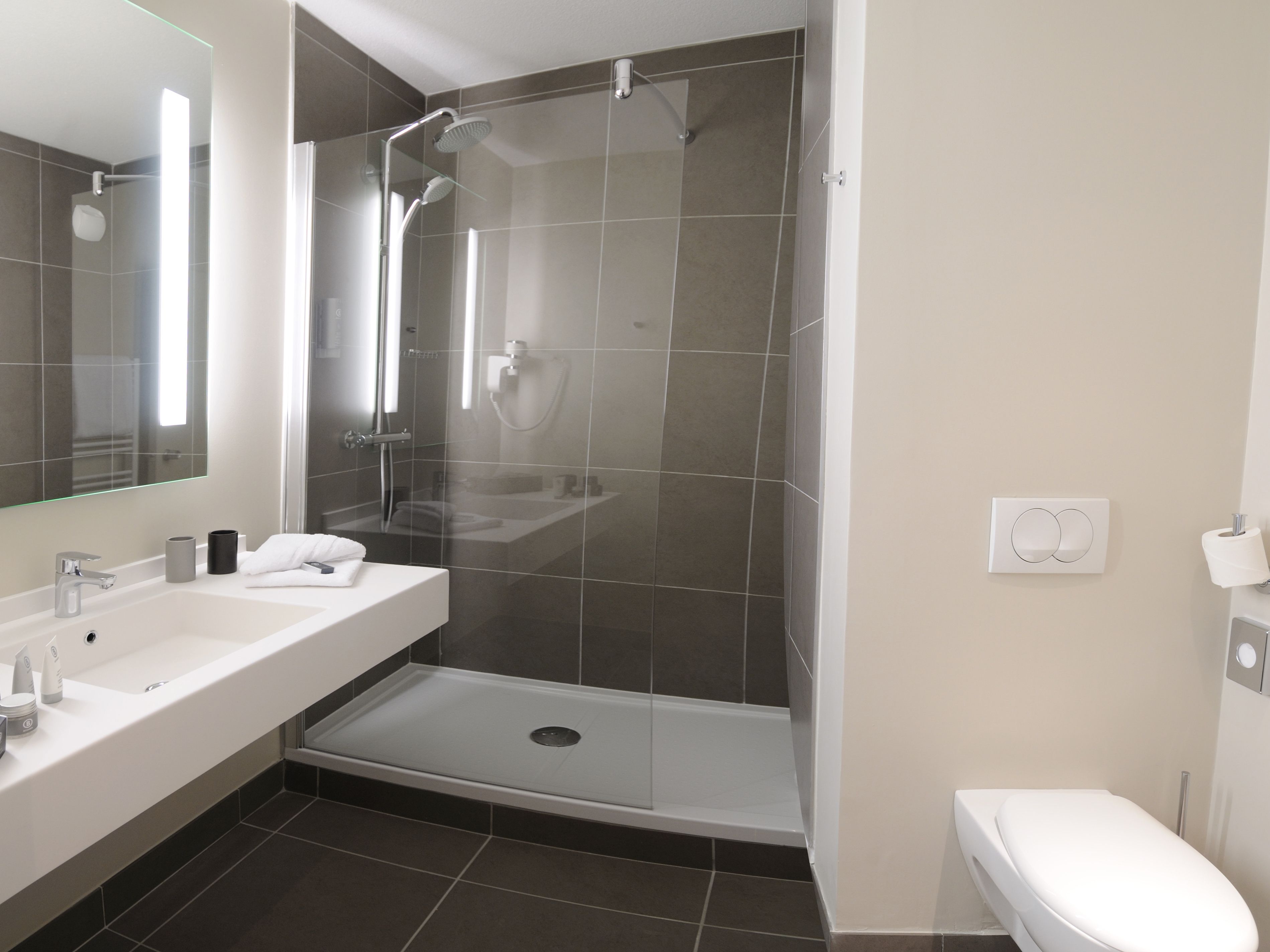 shower, hair dryer, bathrobes, slippers