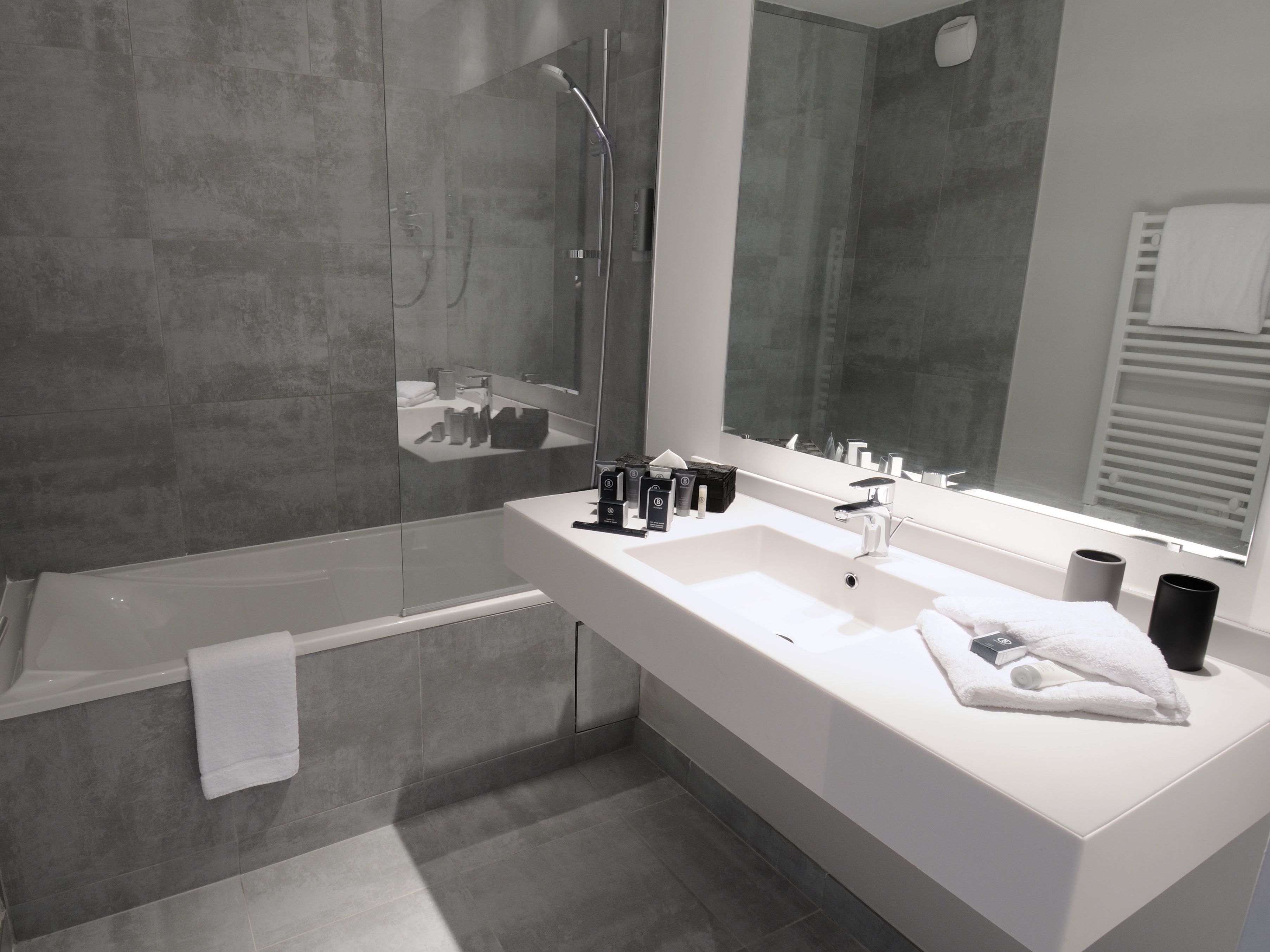 shower, hair dryer, bathrobes, slippers