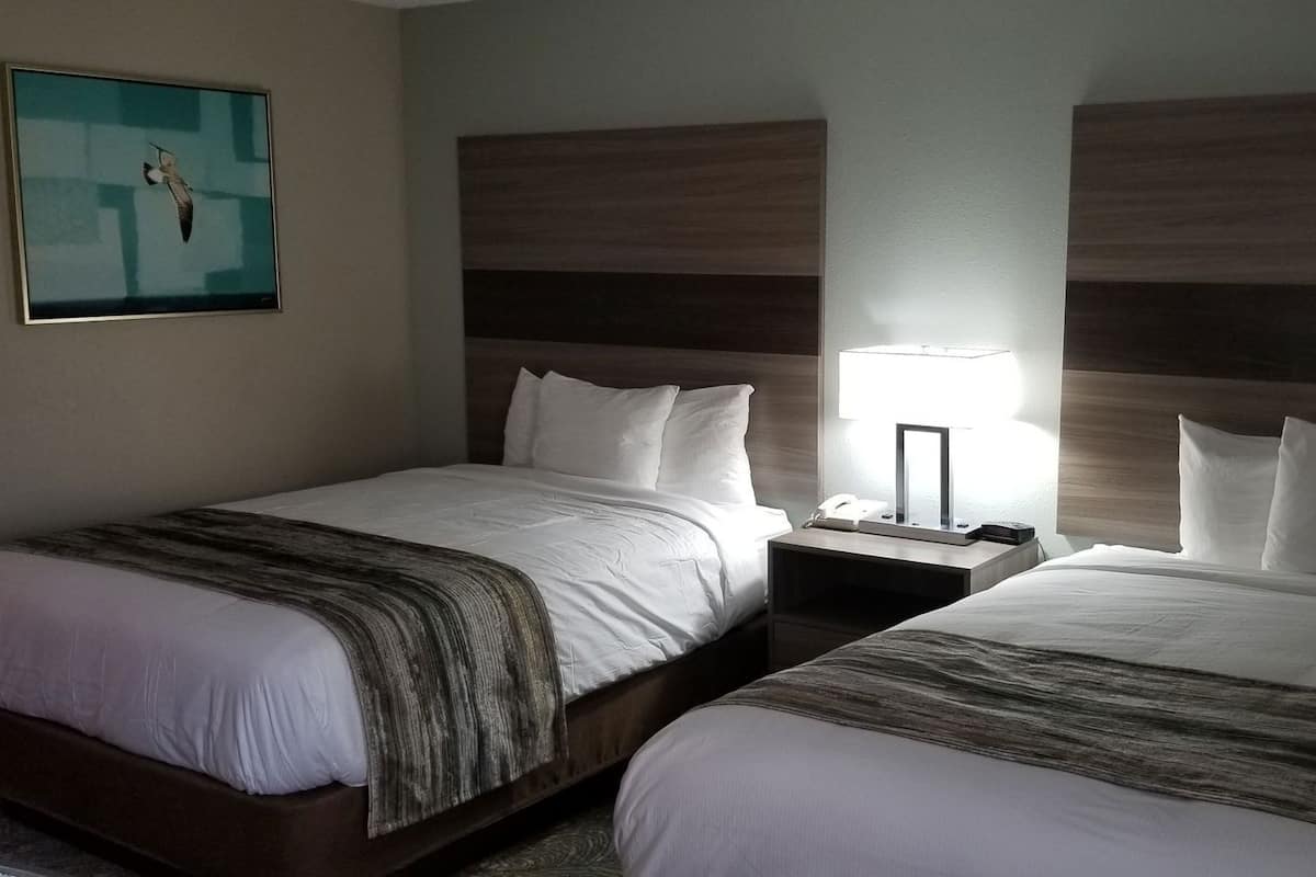 Pillowtop beds, desk, laptop workspace, blackout drapes